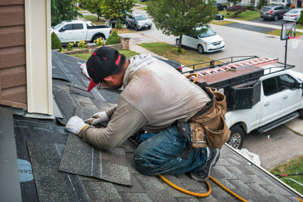 Professional Roof Installation technician working in Bat Cave, NC